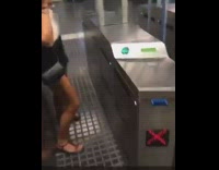 girl white shirt runs into closing door