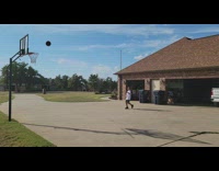 Kid land basketball shot from far distance