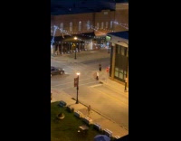 Collab IITW - Couple checks traffic poses middle of street