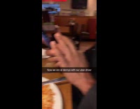 Filmer and friend eats with Uber driver