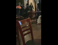 Girl black sleeves skirt dance resto bar