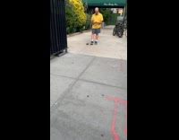 Man yellow shirt with pet turtle street