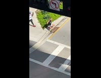 Man black top danced to the beat at the sidewalk