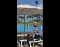 Woman gold bikini sunglasses pool photo shoot