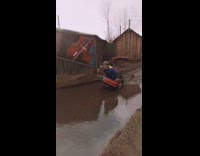 Blue jacket guy falls in mud puddle 
