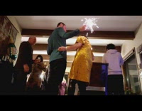 Guy sets womans hair on fire with sparkler