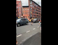 Collab WINY - People dance in street block traffic pride 