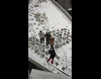 Three men winter coat jacket snow sidewalk