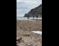 Woman bikini yoga pose at the beach