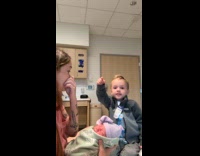 Boy meets her baby sister inside hospital