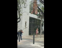 Girl poses for photo outside store