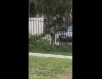 Black bandana around neck guy dances