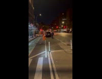 Old man in suit rides the skateboard