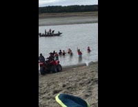 Three girls practice dance river motorcycle boat
