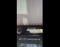 Guy wearing traffic cone dances in street