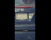 Paper license plate duct taped to car 