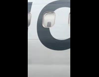 Collab ClipsIG - Phone placed on airplane window to film