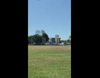 Guy black hat run into dust devil