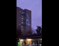 Lights show on building circles Japanese Kanji