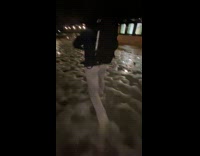Guy slipping on ice falling