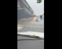 Collab WINY - Filmer in car pass by flooded street sewer overflows part 1