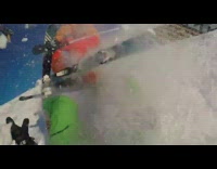 Orange skier crashes into gopro camera and falls in the snow