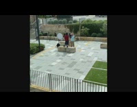 Woman red polo photo shoot rock park