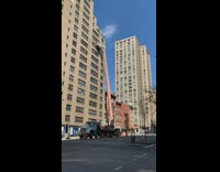 Tall orange ladder lift in new york 