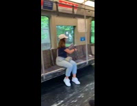 Guy kneels on one knee in front of subway train doors, train shouts yeah boy