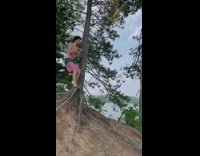 Guy swings on tree and hits butt on ground