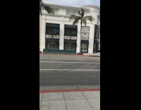 Black shorts guy resistance band workout street