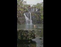 Woman black bikini dip hair flip waterfalls Part 2