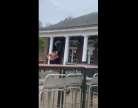 Collab IITW - Guy film shirtless friend jog outside cafe