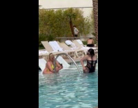 Woman black bikini twerks for pool video