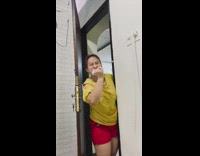 Yellow shirt girl brushes teeth 