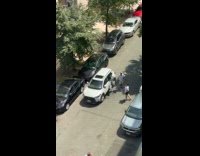 Truck tore out car door on street