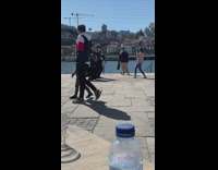 Group of people dance cover by the river
