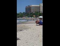 Man and woman sweet pose on the beach shore