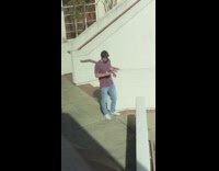 Two men maroon shirt parkour stairway ups