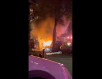 Submitter shows parked car burning on street