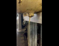 Truck oil flows down perfectly to bucket