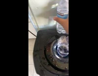 Water bottle placed on dispenser and replaced