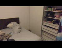 Slowmo rabbit jump from shoulder to bed