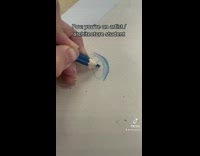 Drawing eye with blue color pencil