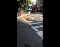 Guy black cloth covers genitals crosses street 