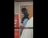 Collab BitchMP - Woman waiting in line with huge black astronaut mask on 