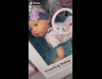 Crawling toy baby looks like its dancing
