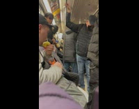 Guy bring peeler and eats apple on the train 