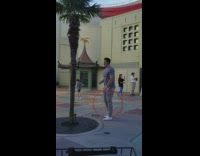 Man films self hula hoop kids