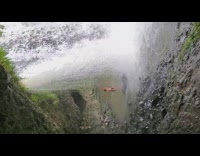 Woman black bikini raise hand waterfalls pictorial